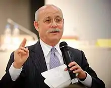 Head shot of middle-aged man giving a speech