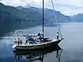 A sailboat explores Princess Royal Reach of the Jervis Inlet.