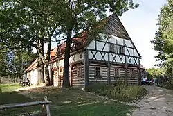 A timber-framed house in the village