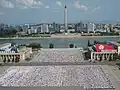 The Kim Il Sung Square and the Tower of Juche Idea seen from the Grand People's Study House.