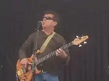 Joe Puerta onstage with Ambrosia, 25 April 2015 in Manhattan Beach, California
