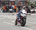 18th Isle of Man TT race win for John McGuinness and new race record. Superbike TT 999cc Honda Parliament Square, Ramsey – 2 June 2012