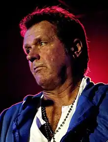 John Wetton playing bass live (cropped).jpg