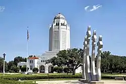 The Administration Building at Joint Base San Antonio–Randolph with the Missing Man Monument in the foreground.