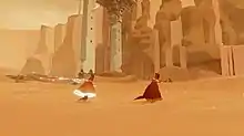 A red-robed figure runs through the sand in front of some stone ruins, accompanies by another figure. The trailing figure's robe and scarf are glowing.