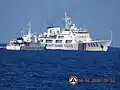 BRP Malabrigo (left) in an encounter with China Coast Guard ship No. 4203 (right) at Second Thomas Shoal. June 2023.