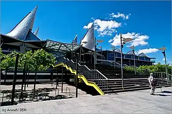 Entrance to the building is via a staircase from Bolivarplaats which runs over a tram line.