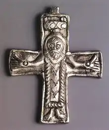 A small object depicting Jesus on the cross