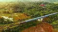 Pangrango train passing through a bridge between Cigombong and Maseng stations