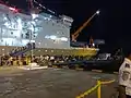 KM Gunung Dempo unloading cargo and passenger at port of Ambon.