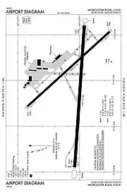 A map with a grid overlay showing the terminals runways and other structures of the airport.