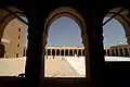 Courtyard seen from one of the arched galleries