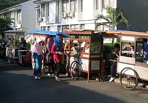 Cart hawkers selling various Indonesian foods in Jakarta