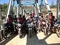 Locals crossing the bridge