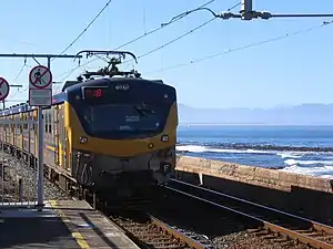 A Metrorail train pulling out of Kalk Bay station.