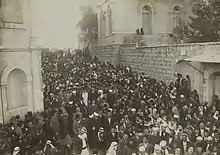 A mass of people in the Christian Quarter during the funeral of the Grand Mufti of Jerusalem Kamil al-Husayni, 1921