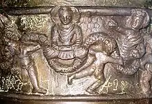 Erotes, garland and the Buddha on the Kanishka casket