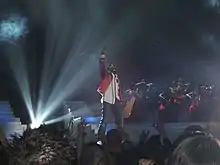 West performing a song medley at the 26th Brit Awards