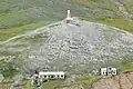 Cape Dezhnev (Chukotka, Russia): Lighthouse with Dezhnev Monument; relicts of abandoned village Naukan