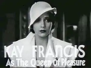  a comely brunette in a white hat and jacket is captioned as the queen of pleasure for the film The House on 56th Street.