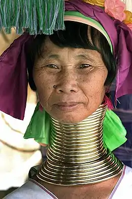 The Kayan people of Burma (Myanmar) associate the wearing of neck rings with feminine beauty.