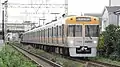 Orange-beige liveried set 1734 in July 2013