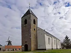 Michaelkerk with windmill on the left