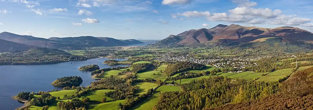 Image 14Lake DistrictPhoto: David IliffA panoramic view of Skiddaw mountain, the town of Keswick, and Derwentwater, as viewed from Walla Crag on a clear autumn afternoon in the Lake District. Located in North West England, the district is a popular tourist destination and is famous for its lakes and mountains, especially those within its national park.More featured pictures