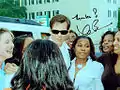 Autographed photo of Kevin Bacon in front of Jefferson courtyard.