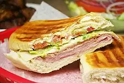 Image 7A Cuban sandwich is a variation of a ham and cheese sandwich that originated among the Cuban workers in the cigar factories in Key West, Florida