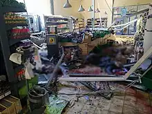 Shelled shop in Kherson, (Kherson Oblast), 3 May 2023