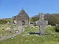 Ogham stone, church, stone cross