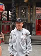  A photograph of Kimi Räikkönen wearing McLaren overalls in 2002. He was one of four drivers to make their Formula One debut in Melbourne.