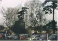 King's Sutton village as seen from the station in 2000. The chain-link fence was replaced in 2009.