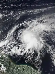 Visible satellite imagery of a strong tropical storm east of the Lesser Antilles on September 26.