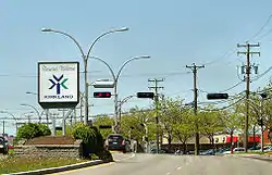 "Welcome to Kirkland" sign viewed from St. Charles Blvd (heading north)