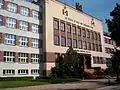 Gymnasium of Vytautas the Great in Klaipėda with Columns of Gediminas on it's roof.