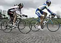 Servais Knaven and Stéphane Poulhies on the Lange Munte cobbles