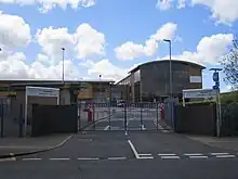 Large building with a locked gate