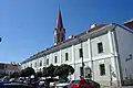 Historic building on Dominican Square, the Dominican Church in the background