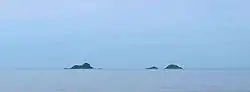 Ko Sai island (left) seen from the shore. Ko Khi Nok (center) and Ko Sadao island (right) are smaller.