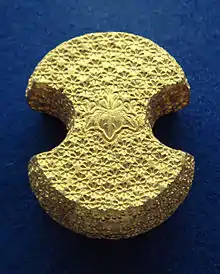 A Kobundō (小分銅), 95–97% gold, "Paulownia" Kiri mark (桐), Kikubana (菊花) emblem, 373.11 grams, Japan.