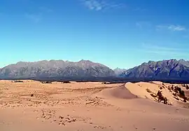 The Kodar mountain range with the Chara Sands in the foreground near Novaya Chara