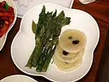 Dureup-bugak (angelica-tree shoot fritter) and chal-jeonbyeong (glutinous rice pancake)