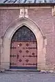 Simple late-Gothic portal to the south porch of the presbytery