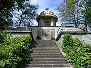 Memorial for the fallen of World War I and II above the town.