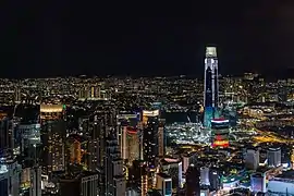 65-meter and 11-storey high illuminated crown at night