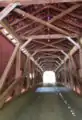 The inside of the bridge showing the Burr arch truss