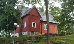 The Kuusisto Church and cemetery on Kuusisto island.