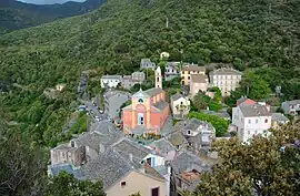 The church and surrounding buildings in Nonza